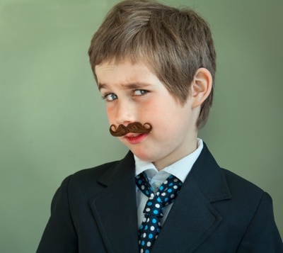 Portrait of boy [7-8] with fake mustache